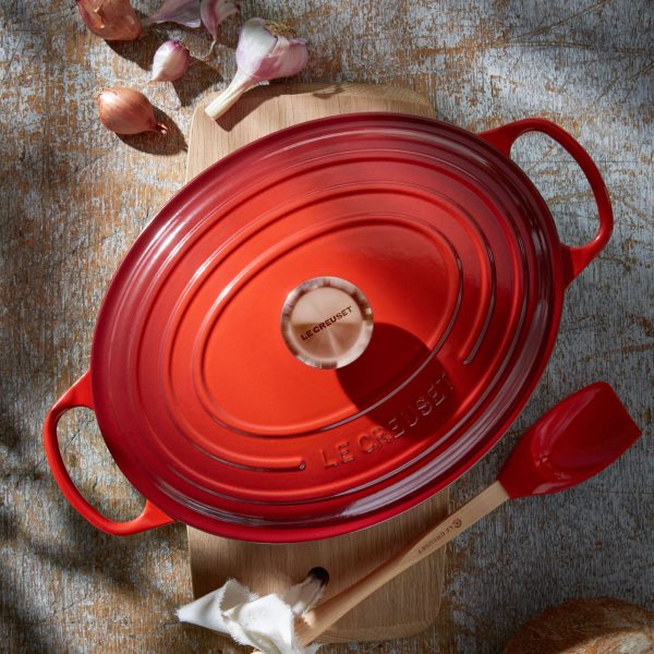 Le Creuset Signature Cast Iron 8-quart Cerise Oval Dutch Oven with Copper Knob - Image 7